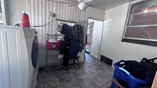 interior space with washer / dryer and ceiling fan