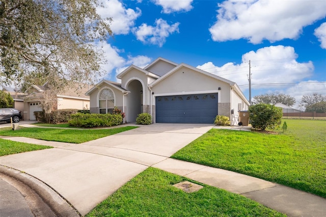 view of front of property with a garage and a front yard