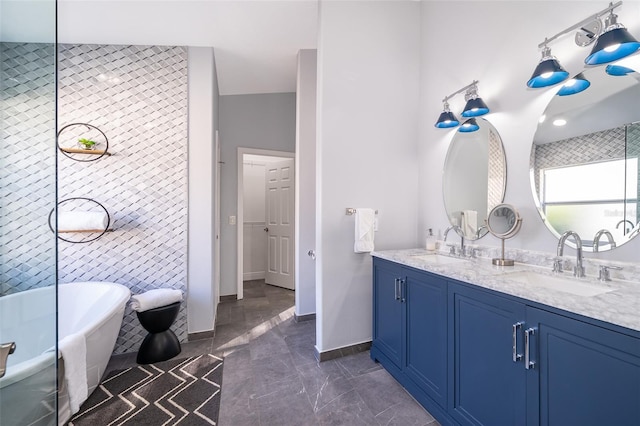 bathroom with vanity and a bathtub