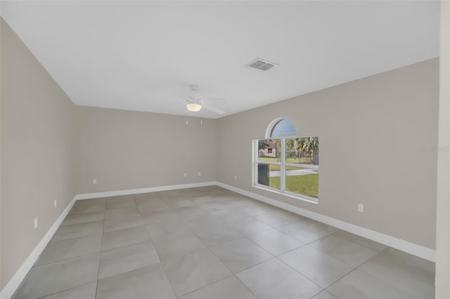 unfurnished room with ceiling fan