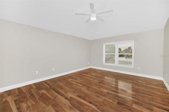 unfurnished room featuring wood-type flooring, vaulted ceiling, and ceiling fan