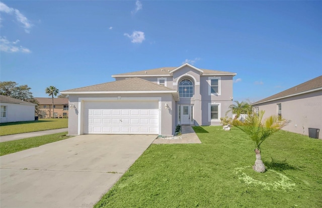 view of front facade featuring a garage and a front yard