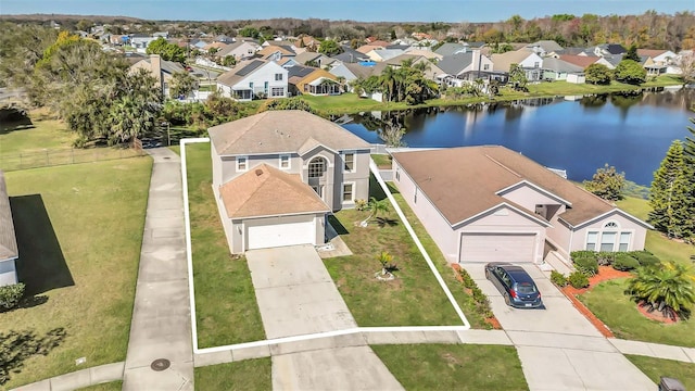 bird's eye view with a water view