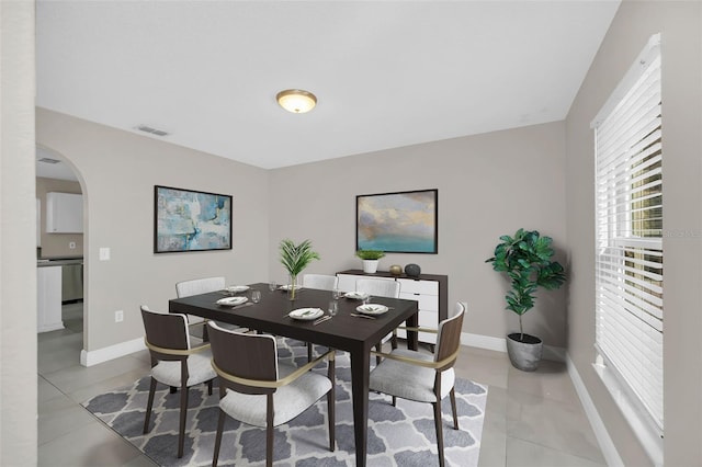 dining room featuring light tile patterned floors