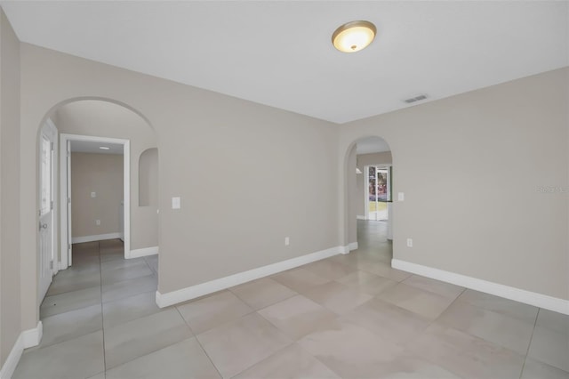 view of tiled spare room