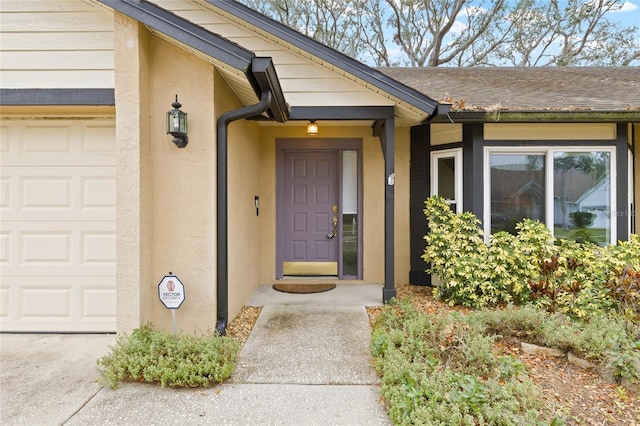 property entrance featuring a garage