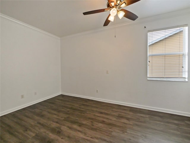 spare room with crown molding, ceiling fan, and dark hardwood / wood-style flooring