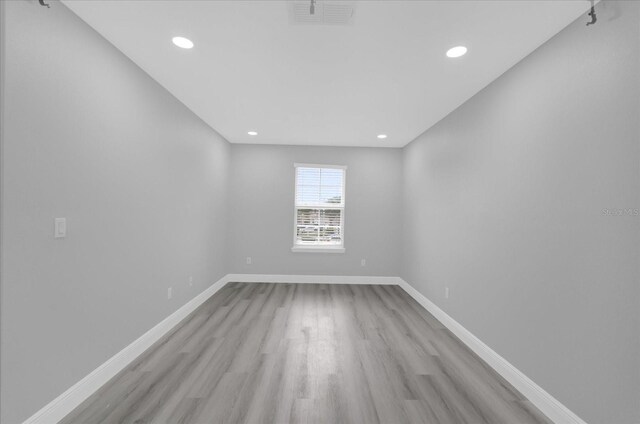 empty room featuring light hardwood / wood-style flooring