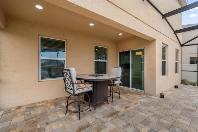 view of patio with a lanai