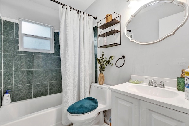 full bathroom featuring shower / tub combo with curtain, vanity, and toilet