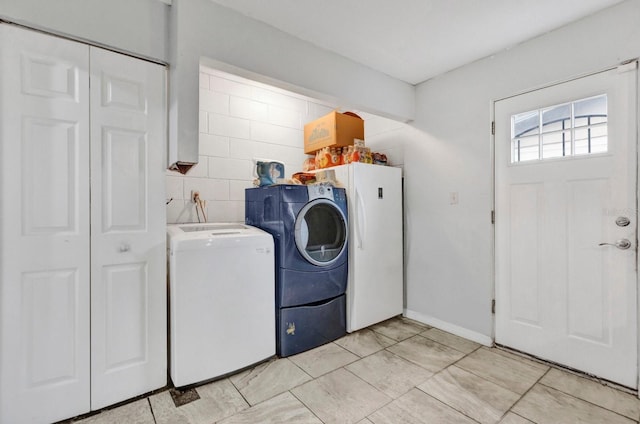 laundry area with washer and dryer