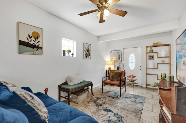 living room with ceiling fan and a wealth of natural light