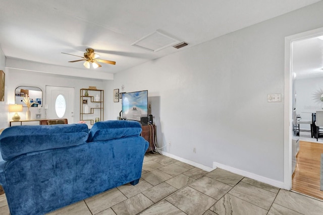 living room with ceiling fan