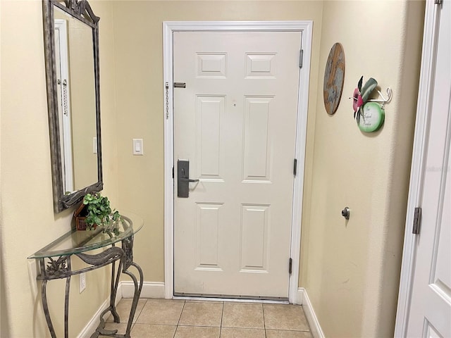 entryway featuring light tile patterned flooring