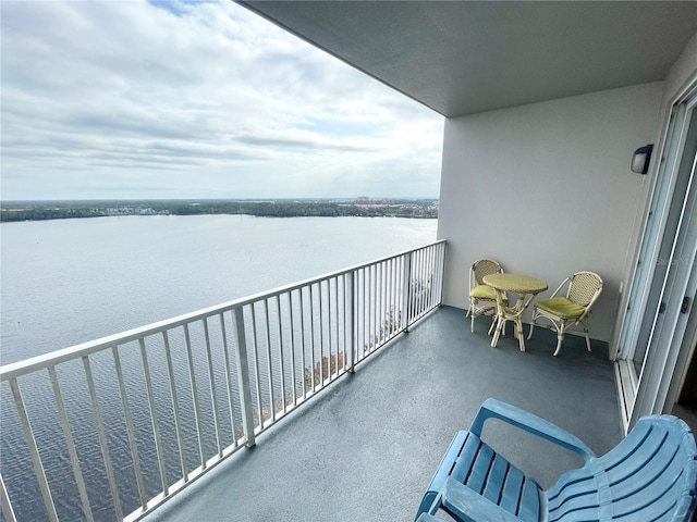 balcony featuring a water view