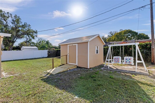 view of outdoor structure with a lawn