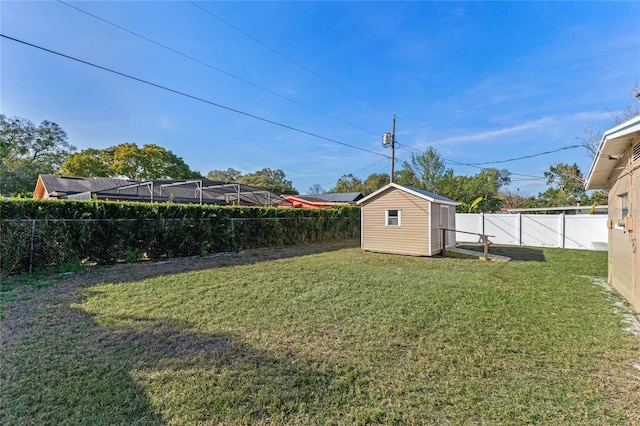 view of yard featuring a storage unit