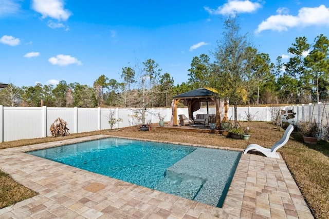 view of swimming pool featuring a gazebo and a patio