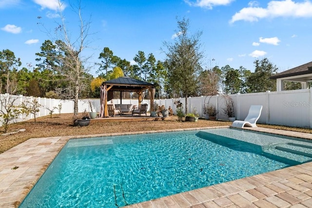 view of pool with a gazebo and a patio area