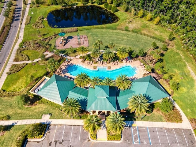 birds eye view of property featuring a water view