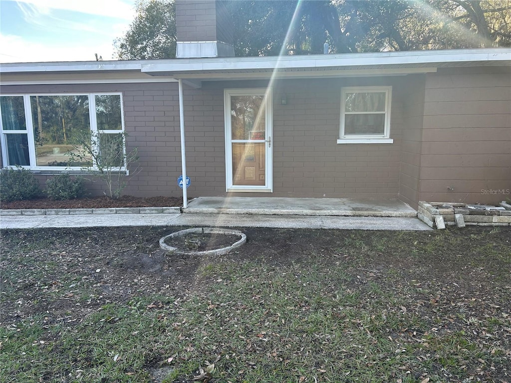 back of house with a patio area