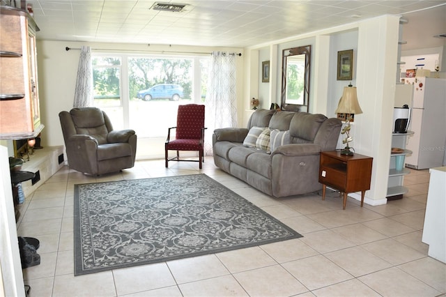 423 Longfellow Blvd, Lakeland, FL 33801 - living room with light tile patterned flooring
