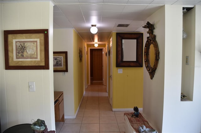 423 Longfellow Blvd, Lakeland, FL 33801 - hallway with light tile patterned flooring and baseboards