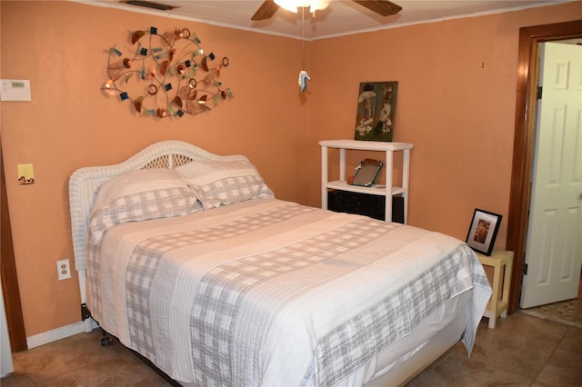 423 Longfellow Blvd, Lakeland, FL 33801 - tiled bedroom with ornamental molding and a ceiling fan