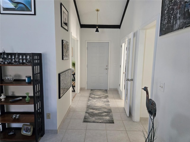 hallway featuring light tile patterned floors