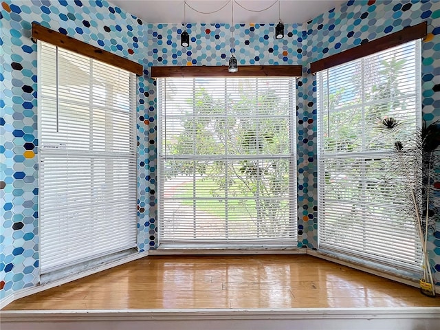 unfurnished dining area with a healthy amount of sunlight