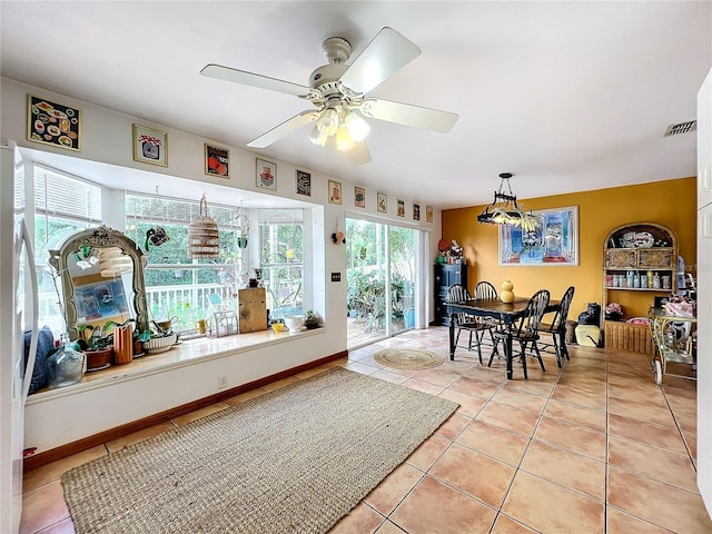 dining room with ceiling fan