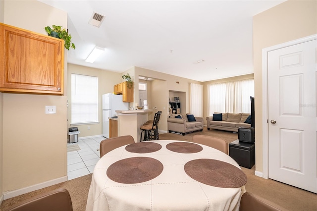 dining room featuring light tile patterned floors