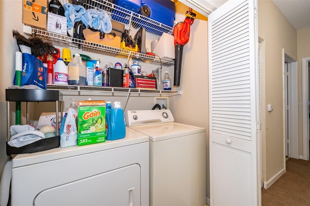 laundry area featuring carpet floors and washer and dryer