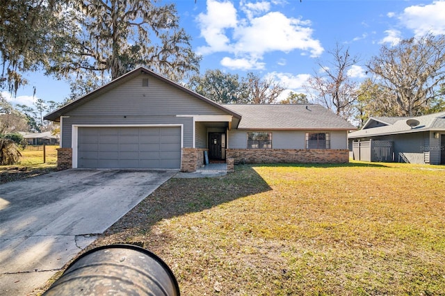 ranch-style house featuring a garage and a front yard