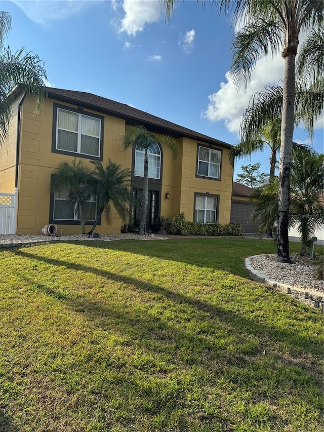 view of front of home featuring a front lawn