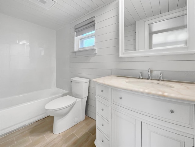 full bathroom with shower / washtub combination, wood-type flooring, vanity, toilet, and wooden ceiling