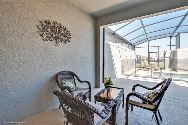 view of patio with a lanai