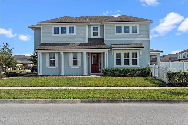 front facade featuring a front lawn