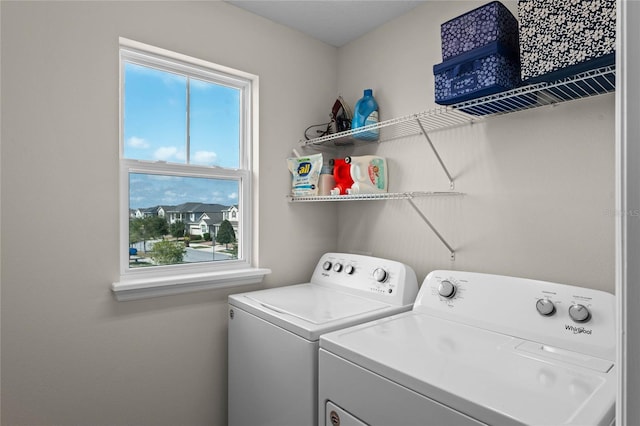 laundry room featuring washer and clothes dryer