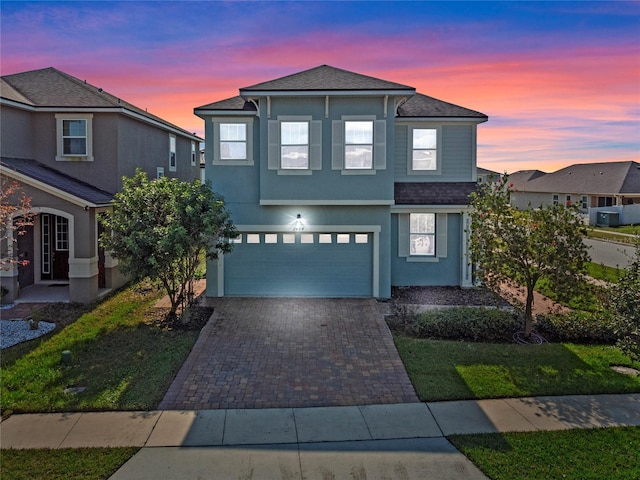 front of property featuring a garage