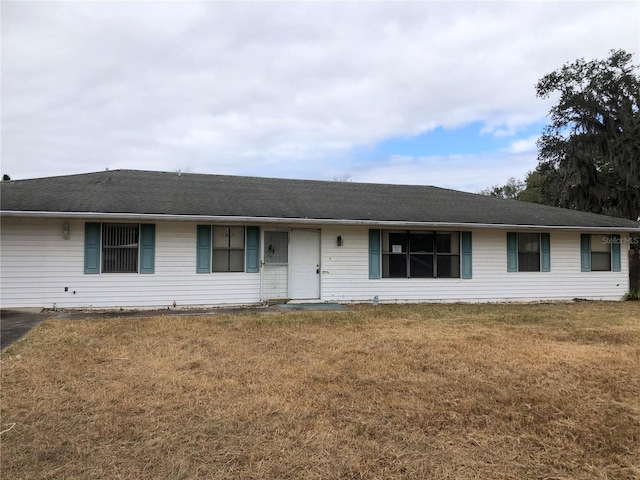 ranch-style house with a front yard