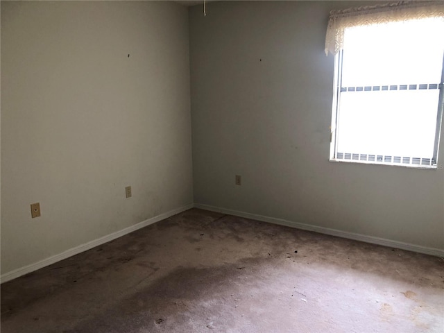 empty room featuring carpet flooring