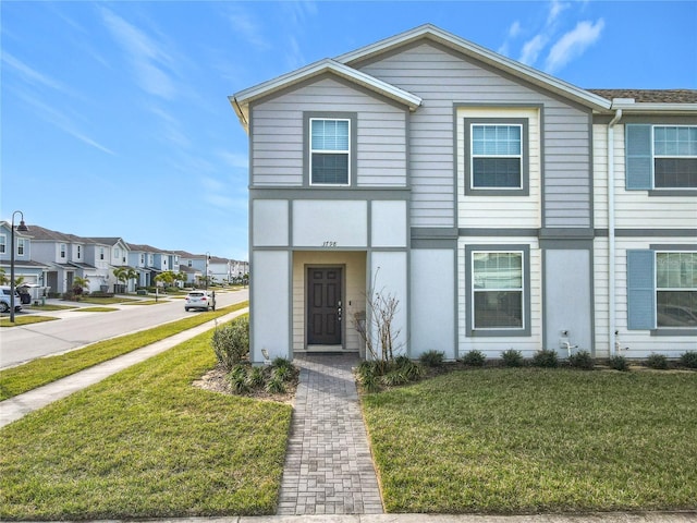 view of front of home with a front yard