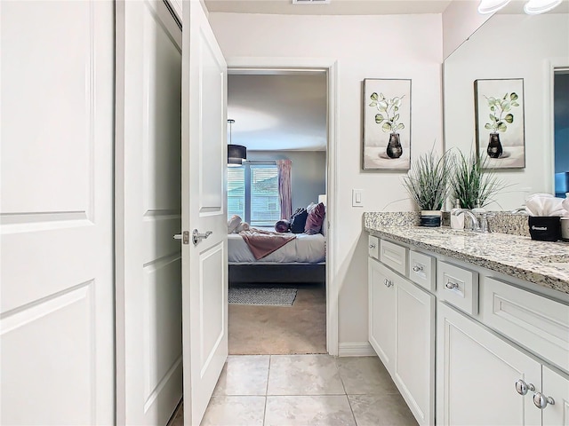 bathroom featuring vanity and tile patterned floors