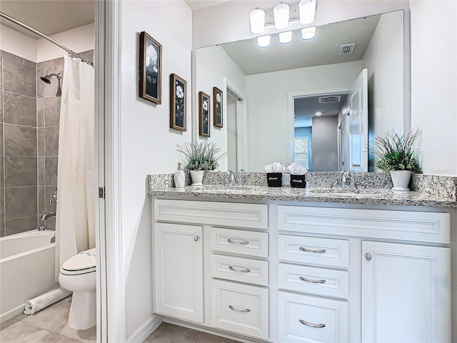 full bathroom featuring vanity, shower / tub combo, and toilet