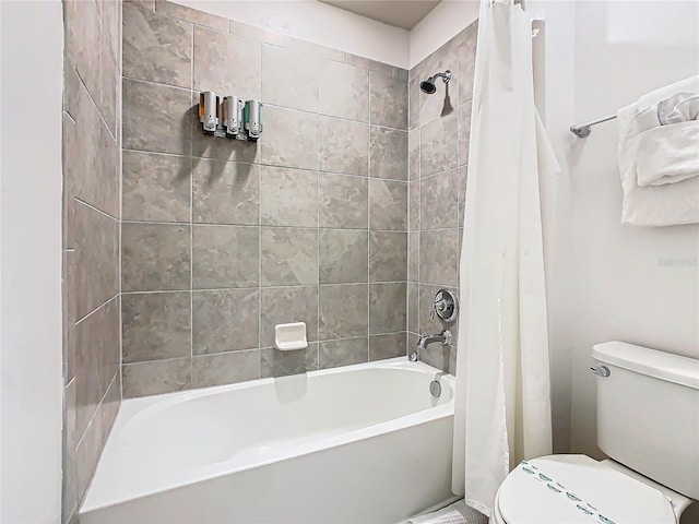 bathroom with toilet and shower / bathtub combination with curtain