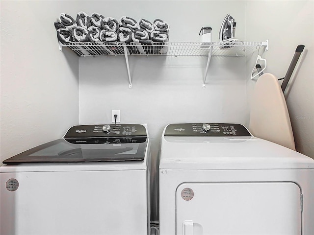 laundry room with washer and dryer