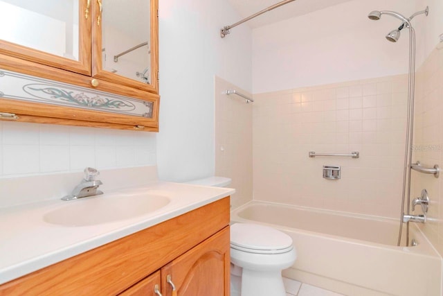 bathroom with shower / bath combination, vanity, toilet, and tile patterned floors