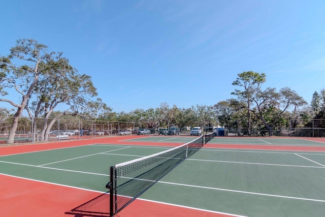 view of sport court featuring community basketball court and fence