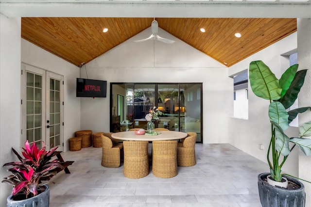 interior space featuring ceiling fan and french doors